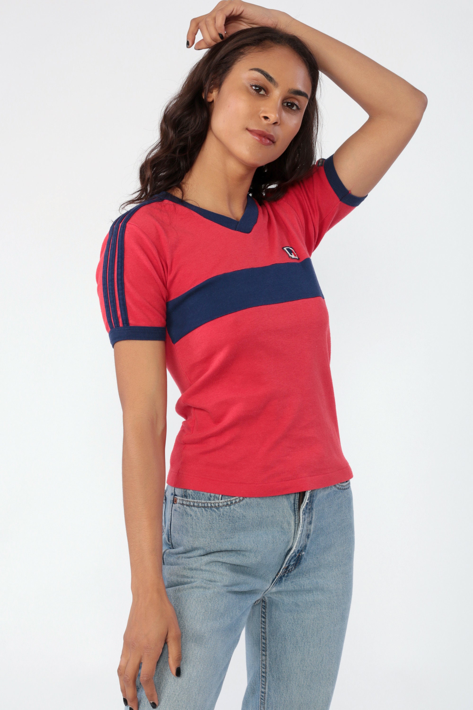 navy blue and red graphic tee