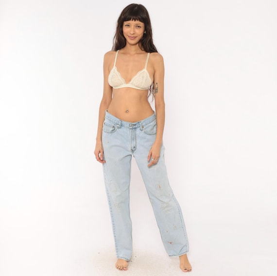 90s Levi's 550 Jeans Light Wash Denim Relaxed Fit Straight Leg Blue Distressed Grunge Boyfriend Style Baggy Pants Stonewash Vintage 32 x 32
