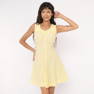 butter yellow fit and flare dress BUTTER YELLOW CREPE FIT AND FLARE DRESS WITH OVERLAY