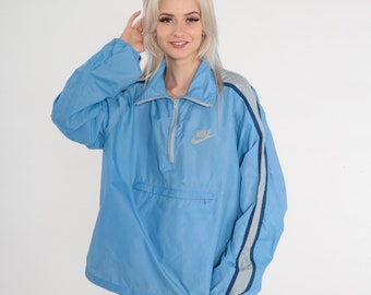 Veste Nike des années 80 bleu coupe-vent rayé pull en nylon veste zippée sur un quart de tour, sport streetwear rétro, manteau shell, vintage des années 1980 Extra Large XL