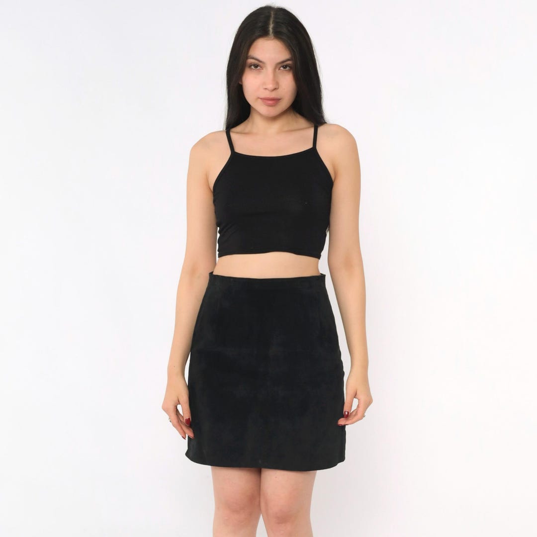 Vintage 90’s black mini skirt with pink bow