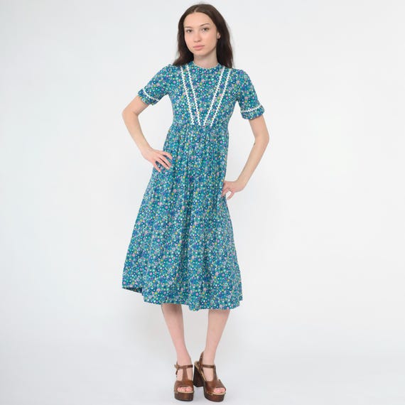blue drop waist mini dress Delicate Dawn Floral Drop-Waist Bubble Mini Dress Retro Blue / M main image 0