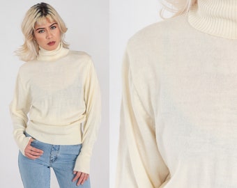 cream colored mock turtleneck