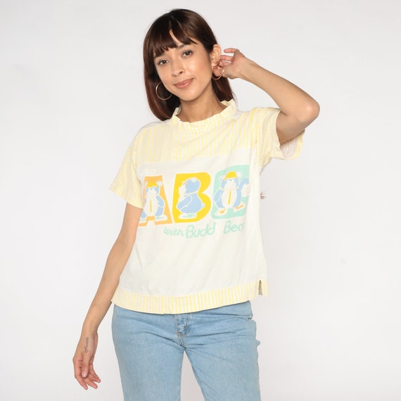 Teddy Bear Shirt 90s ABC Striped Mockneck T-Shirt Buddy Bear Graphic Tee Short Sleeve Top Cute Light Yellow White Vintage 1990s Medium M