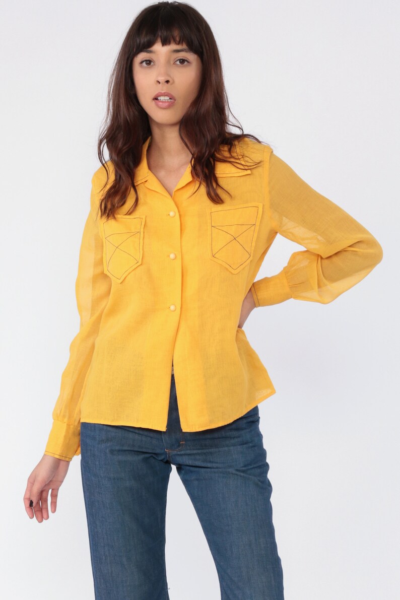 yellow button up shirt
