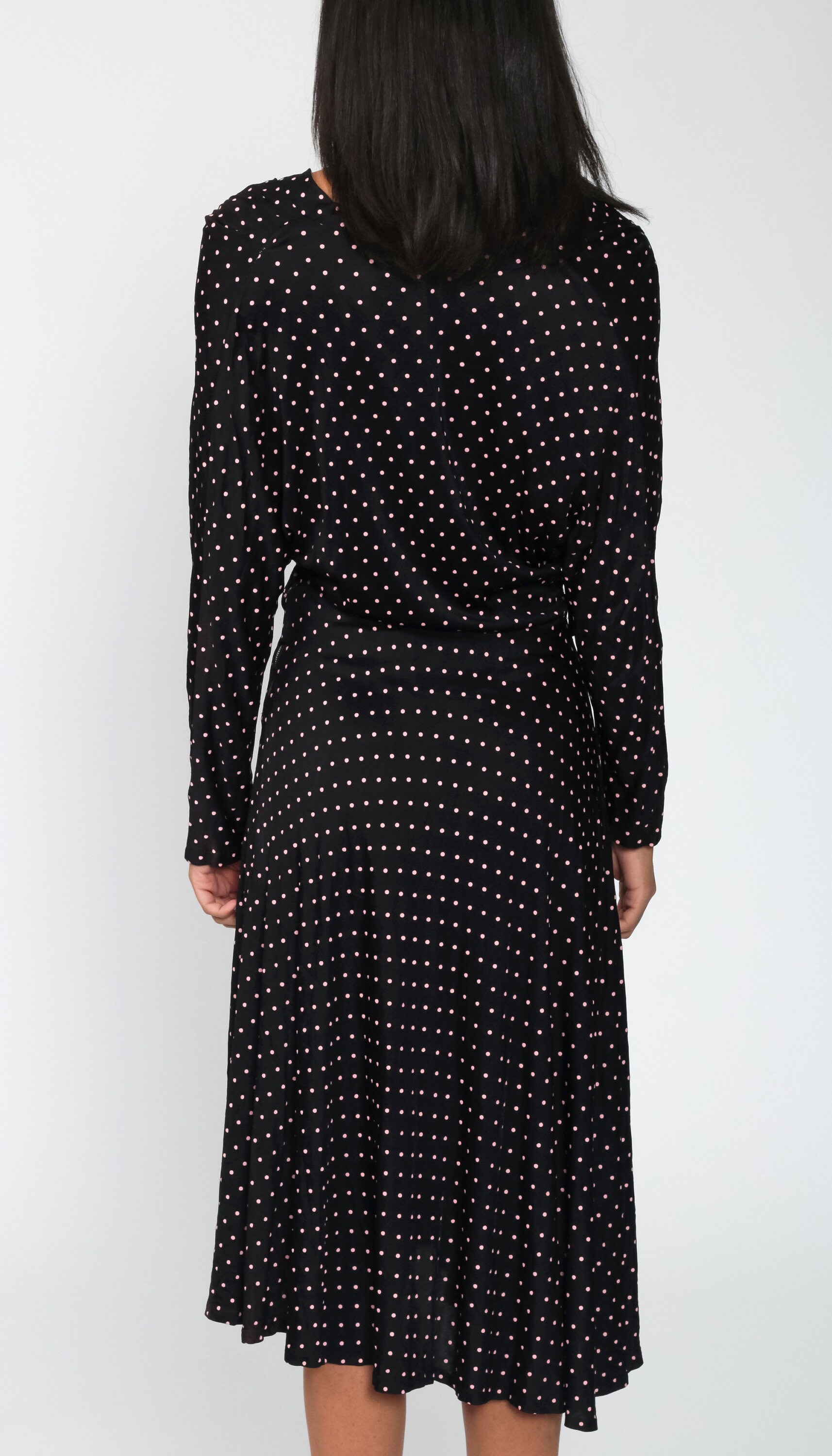 black dress with polka dot sleeves