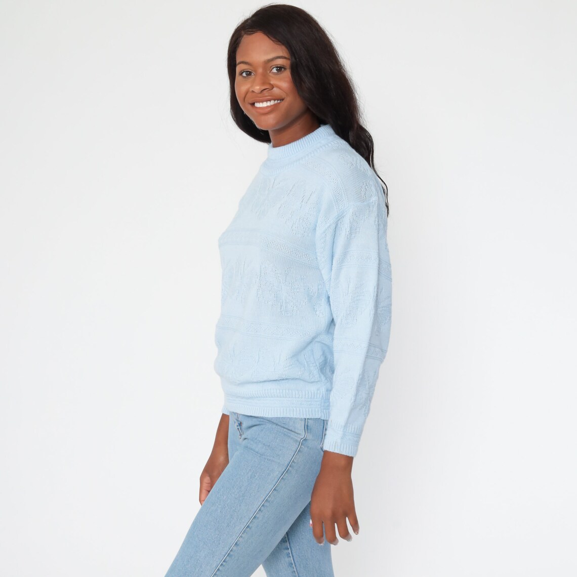 white sweater with blue butterfly