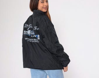 Giacca da camionista nera vintage anni '90, modello DJ Gunite Trucking Nylon Huntington Beach Graphic Snap Up Workwear, taglia XL