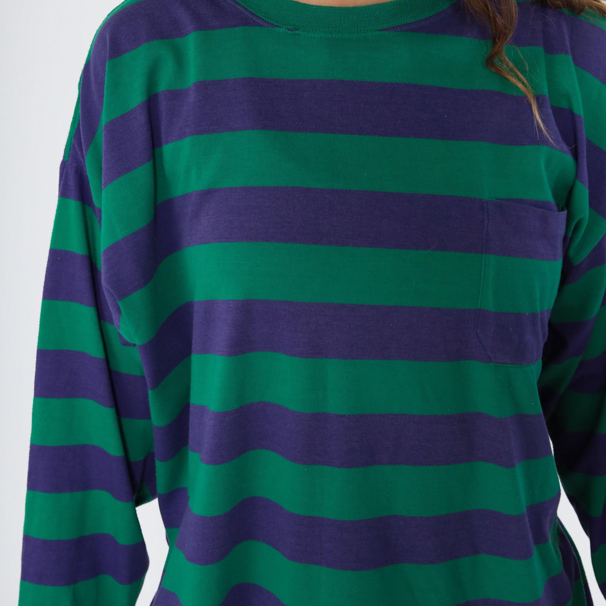 orange and green striped shirt