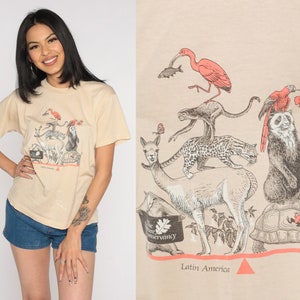 Latin America Shirt Y2K Wildlife Graphic Tee The Nature Conservancy Tortoise Llama Monkey Bird Tourist Travel Animal Tan Vintage 00s Small S