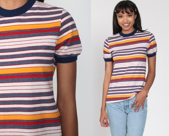 red blue and yellow striped shirt