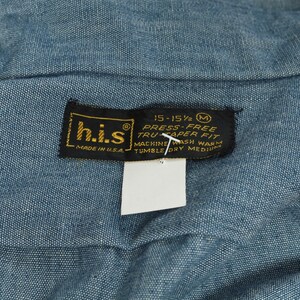 May include: A black and gold label with the text "his" and "MADE IN U.S.A."  The label also includes the text "15-15 1/2 M PRESS-FREE TRUCAPER FIT MACHINE WASH WARM TUMBLE DRY MEDIUM".