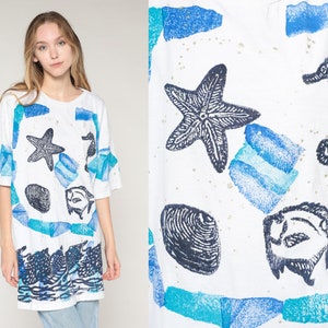 Under The Sea Shirt 90s Painted Tropical Fish T-Shirt Starfish Seahorse Shell Stamp Paint Graphic Tee Ocean White Blue Vintage 1990s 2xl xxl image 1