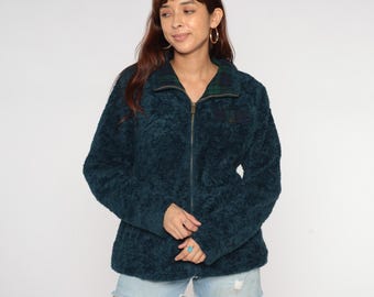 Chaqueta polar Pendleton Y2K color verde azulado con cremallera y cuello a cuadros. Ideal para actividades al aire libre como senderismo, camping, invierno, esquí, otoño y montaña. Estilo vintage. Talla L.