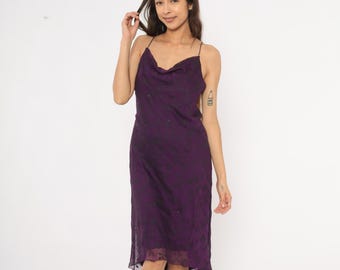 purple sheer chiffon ruched detail asymmetric drape bodycon dress PrettyLittleThing Women's Sheer Chiffon Ruched Detail Asymmetric Drape Bodycon Dress in Plum