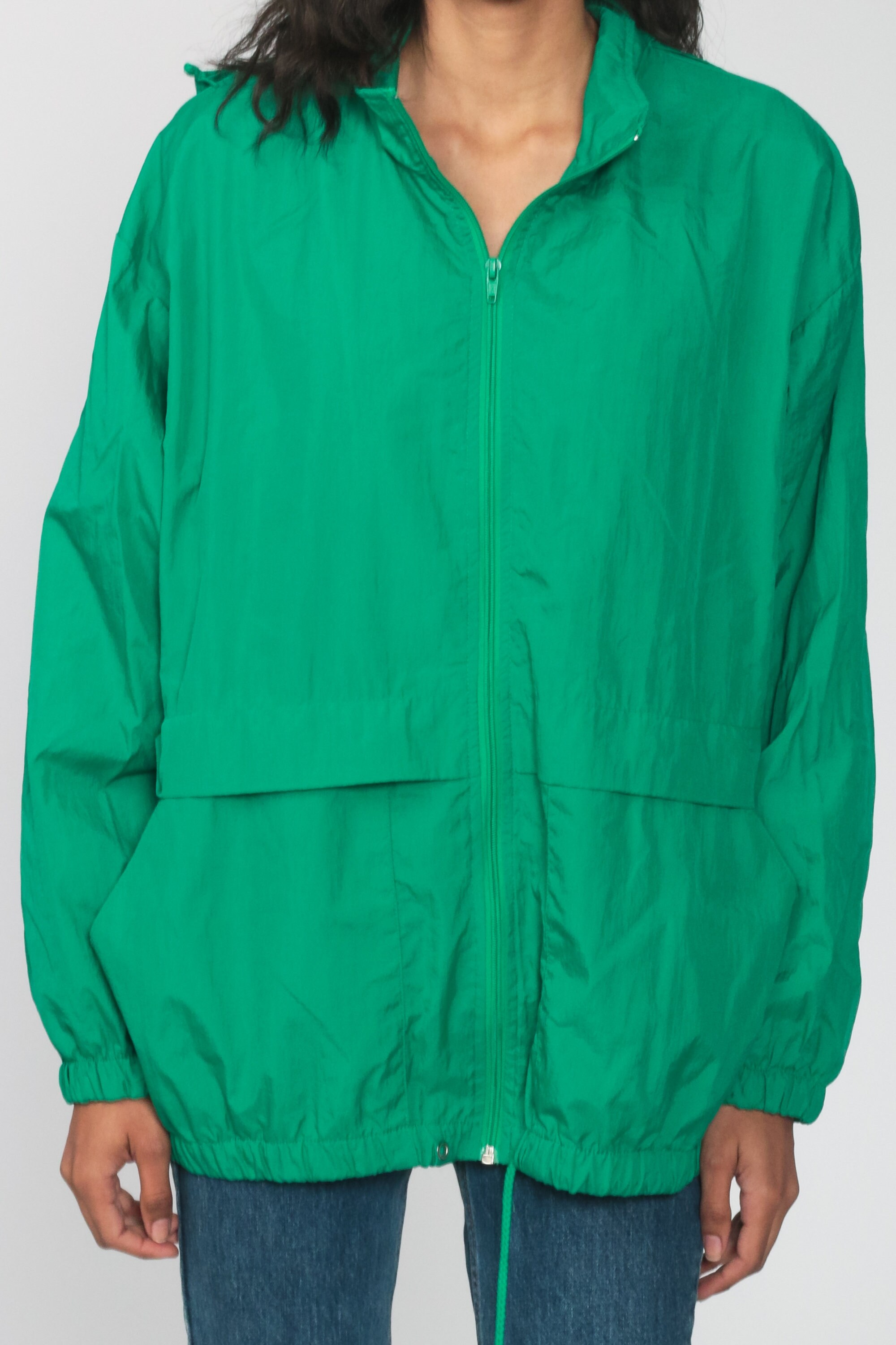 green windbreaker jacket