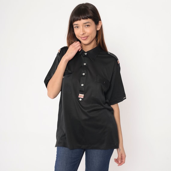 Black polo shirt with epaulettes 2025