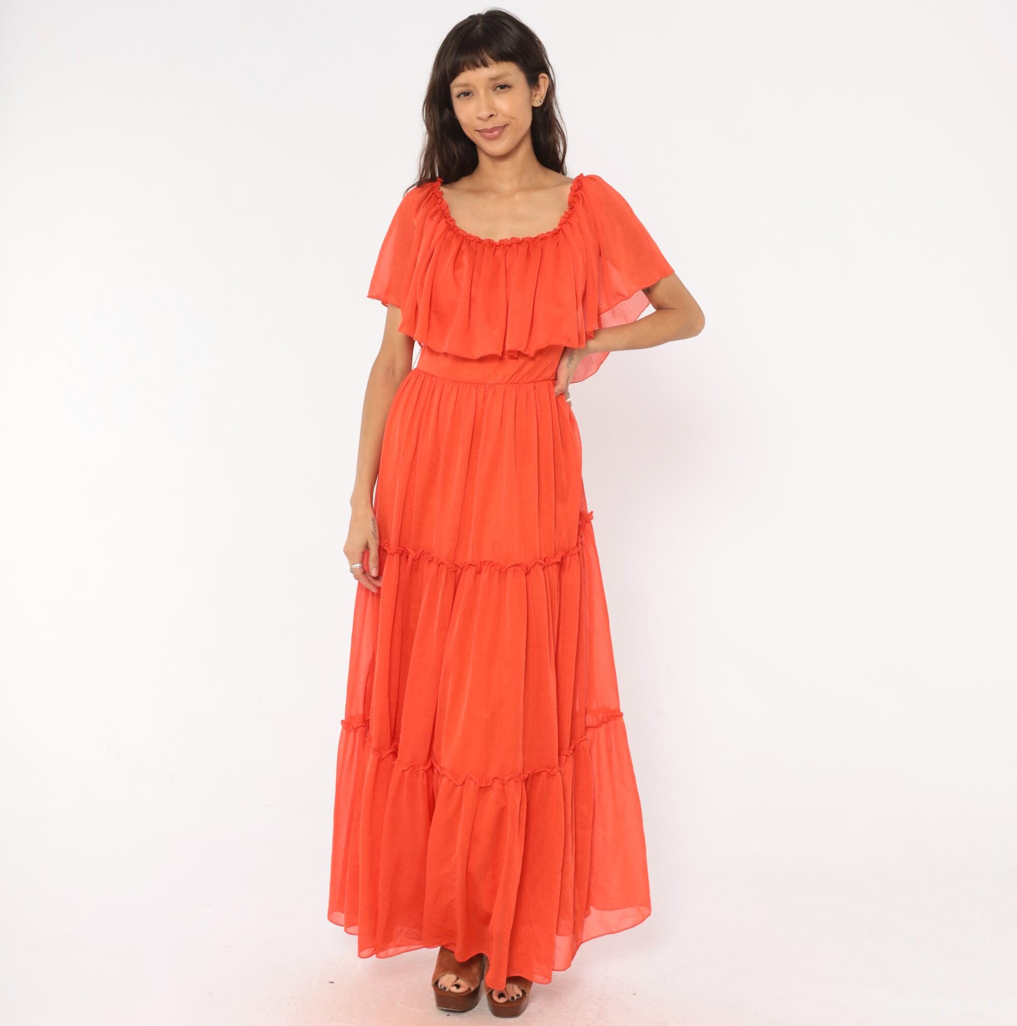peasent ruffle maxi dress Cotton Tiered Model wears size S. Maxi Peasant Solid Ruffle Dress