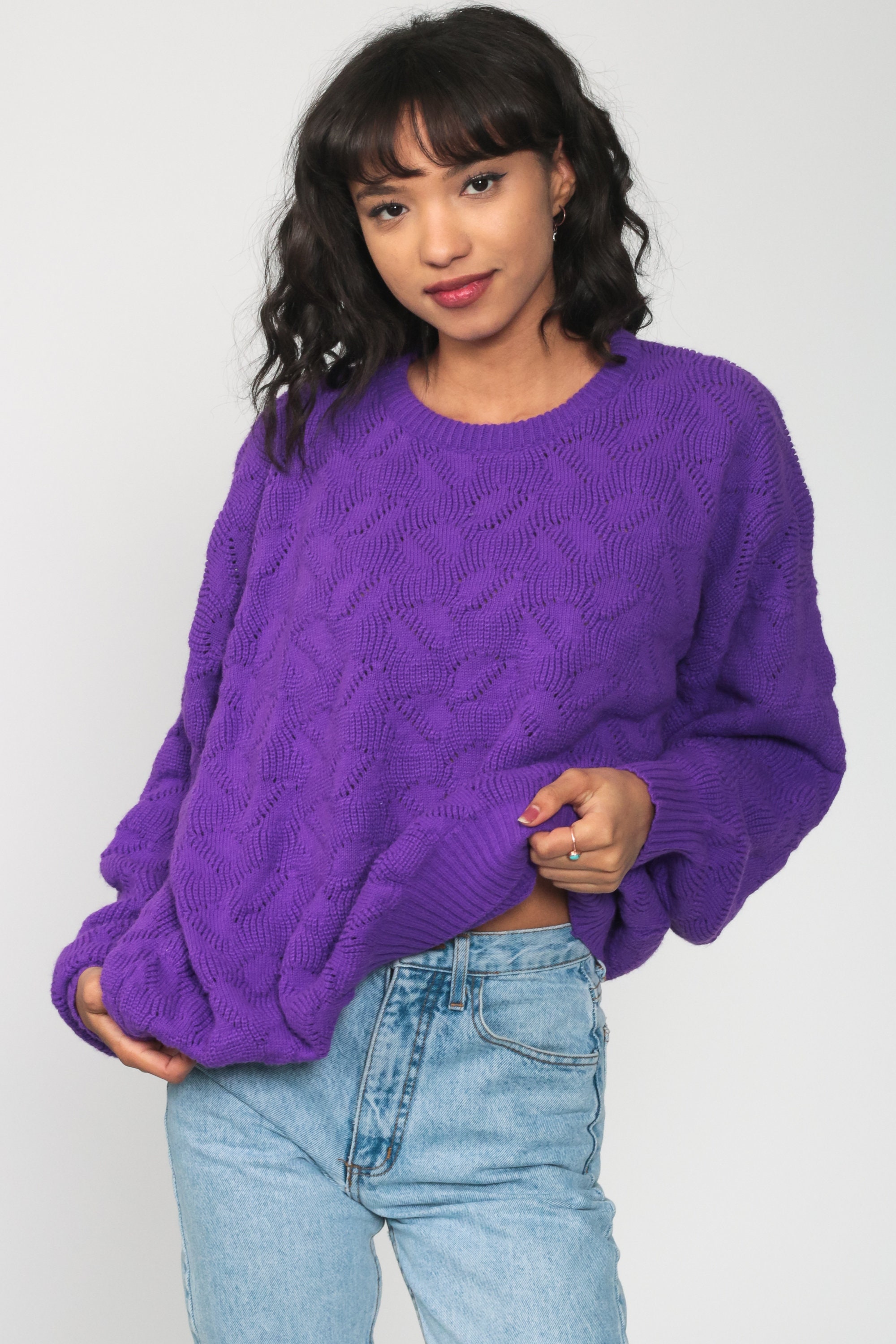 purple and yellow sweater