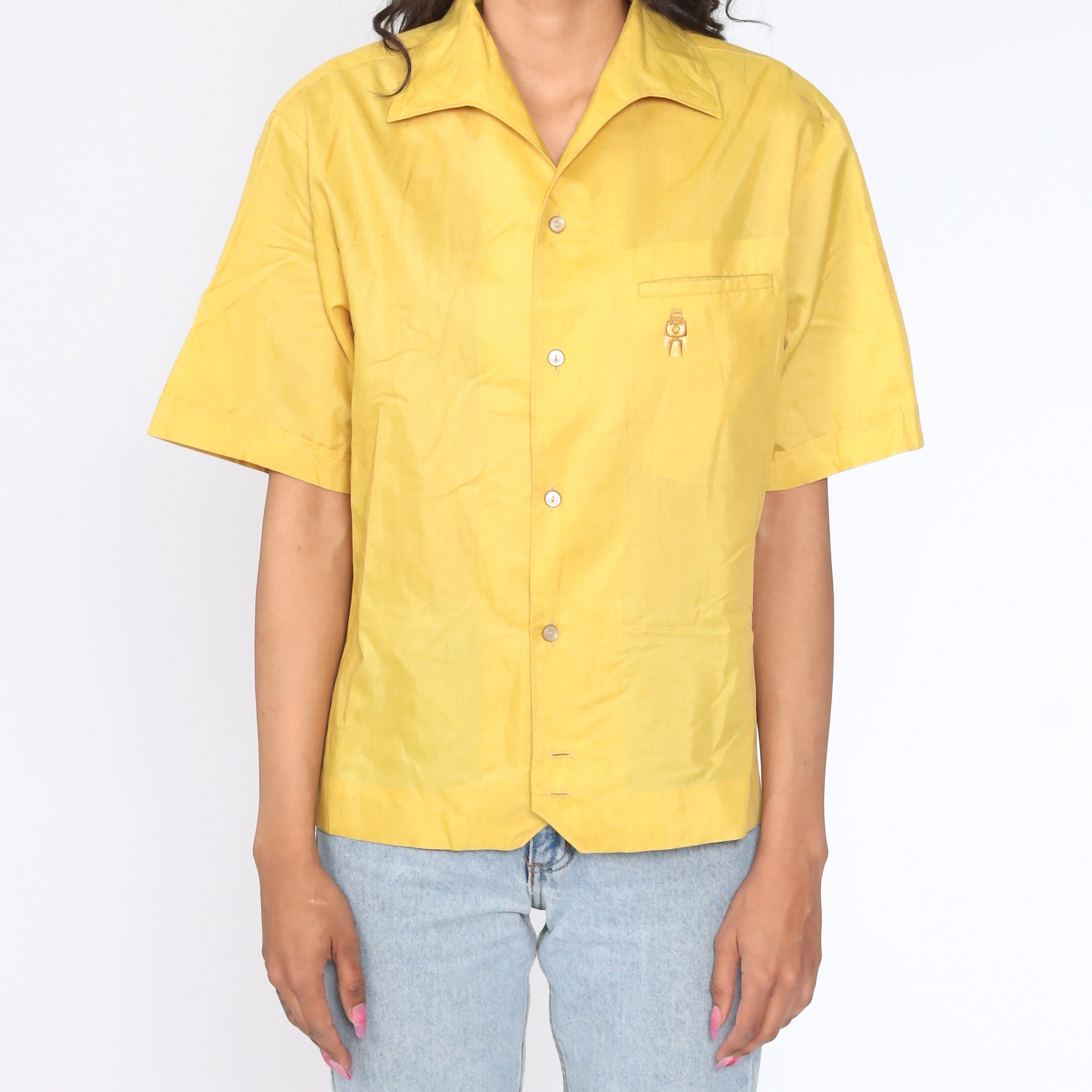 yellow button up shirt