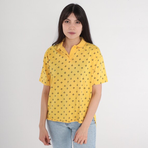 Yellow Polo Shirt 80s 90s Collared T-Shirt Triangle Print Half Button Up Short Sleeve Top Retro Preppy Casual Tshirt Vintage Currents Medium