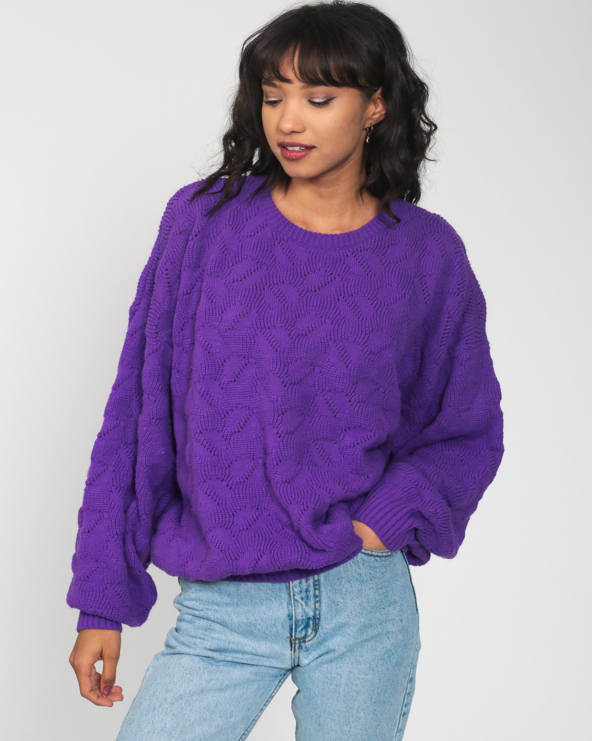 purple and yellow sweater