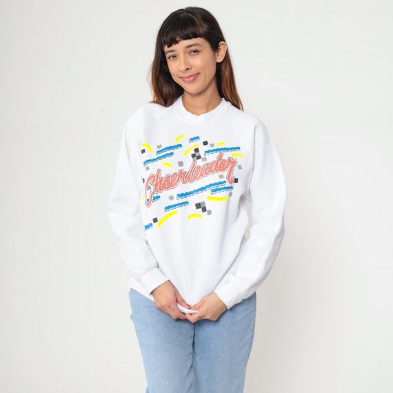 90s Cheerleader Sweatshirt White Graphic Print Raglan Sleeve Pullover Vintage Athletic Pattern Pink Blue Yellow Sportswear Preppy Large L