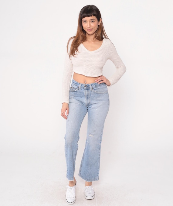 90s Levi's Jeans Wide Leg High Waisted Light Wash Denim Distressed Boyfriend Grunge Y2K Vintage Blue Faded Worn Stone Wash 31 Medium