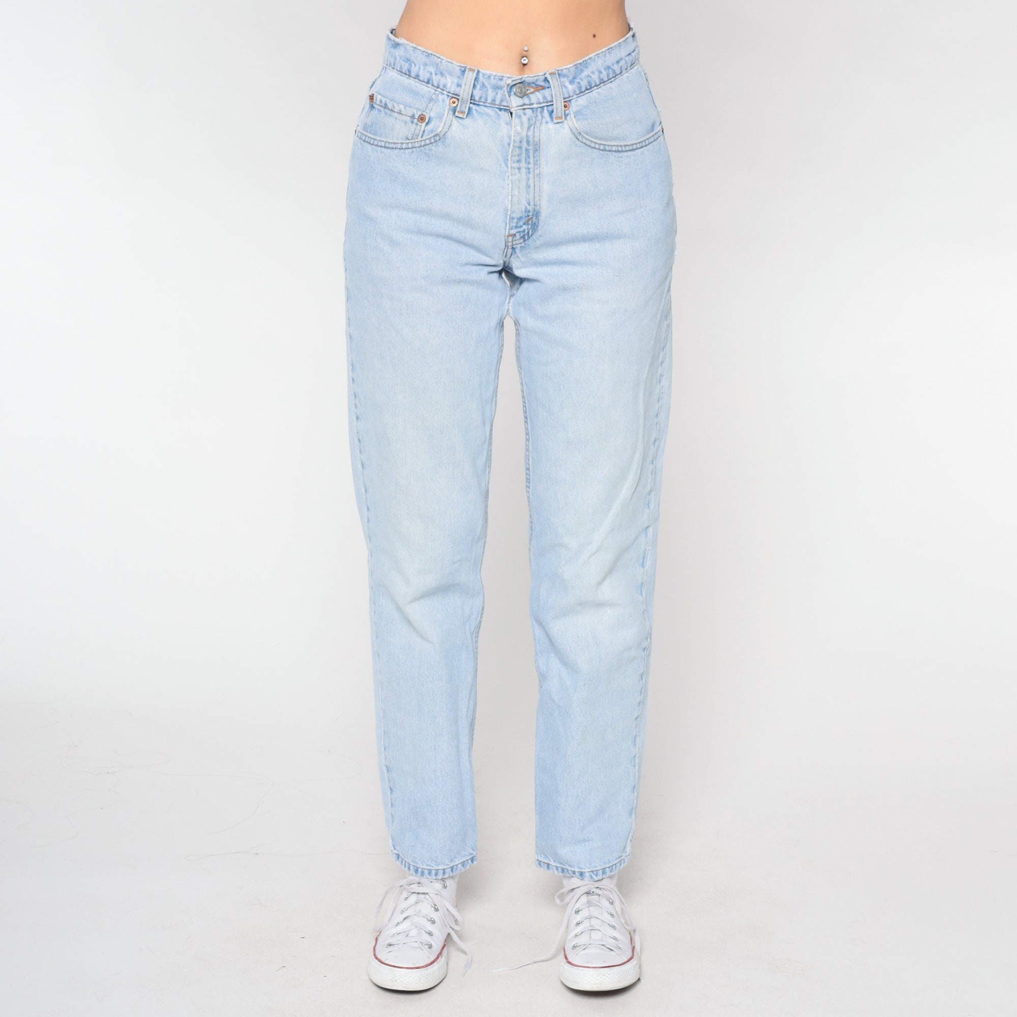 Levi's High Waisted Tapered Jeans In Mid-stone Wash-blues