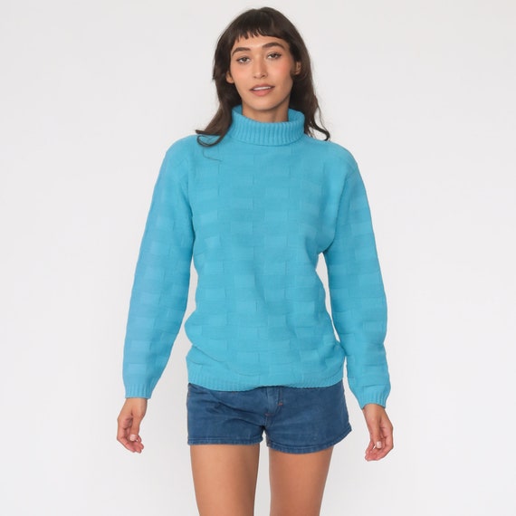 bright blue turtleneck