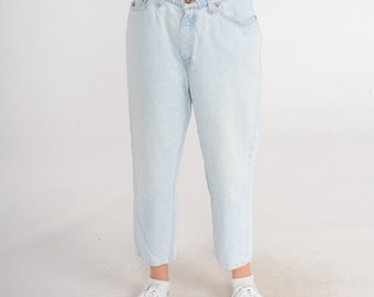 Levis 512 Jeans 90s Mom Jeans Tapered Cropped High Waisted Rise Levi Strauss Denim Pants Light Wash Blue Retro Vintage 1990s Medium Short