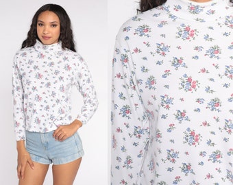 white floral turtleneck