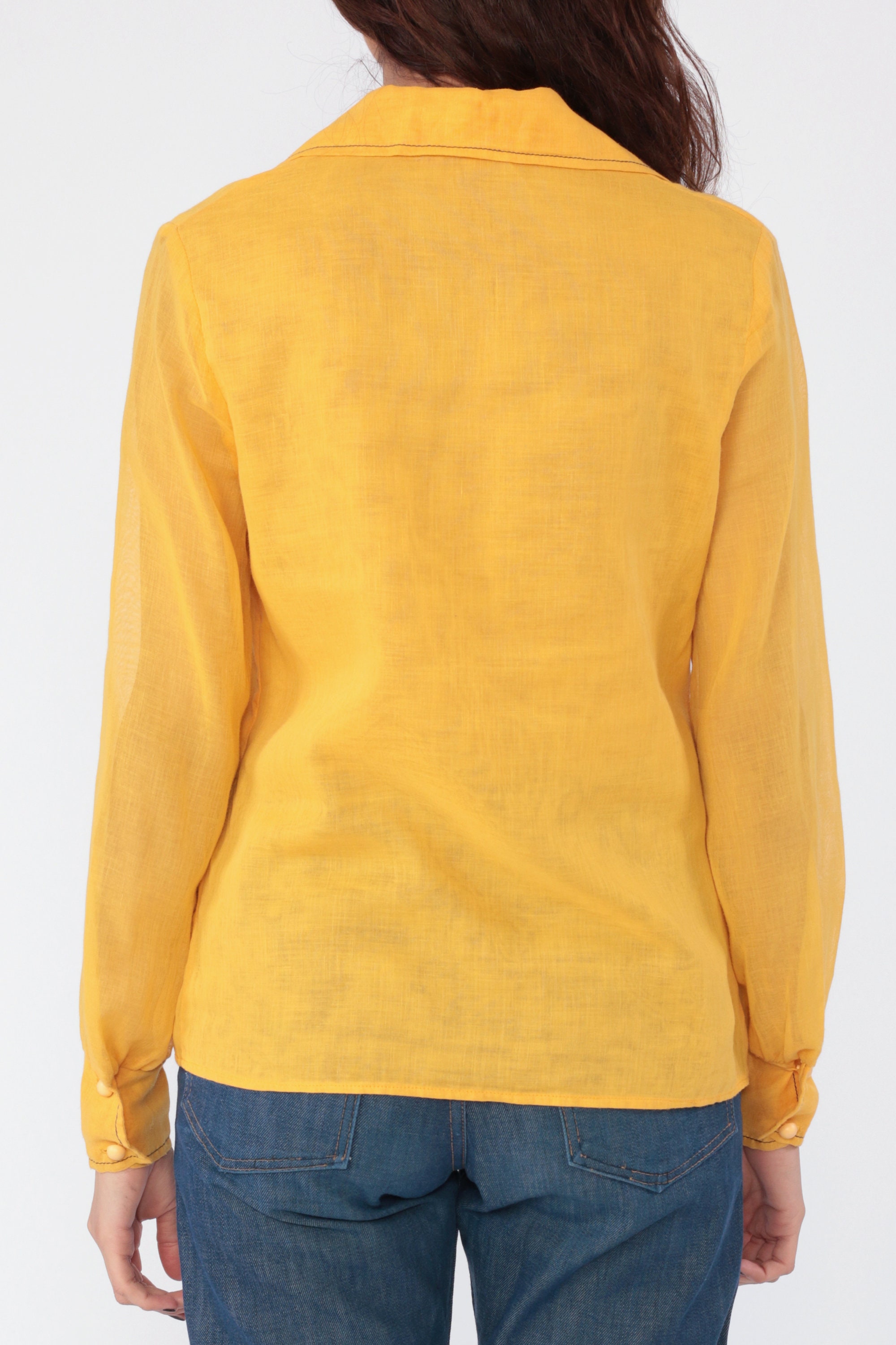 yellow button up shirt