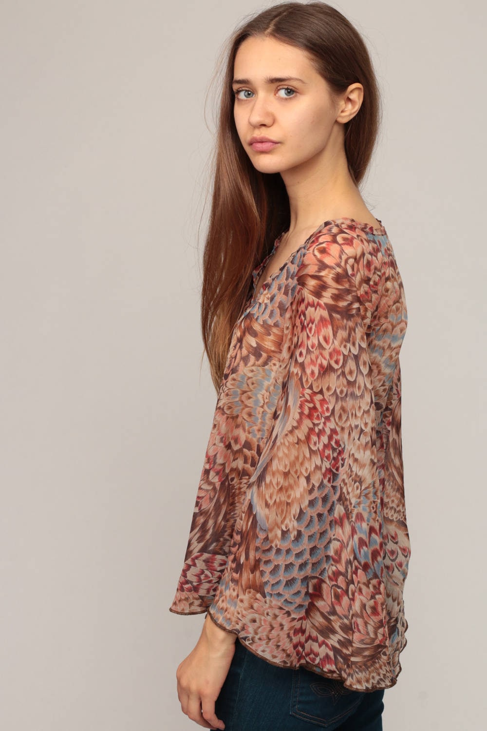 blouse with feather print