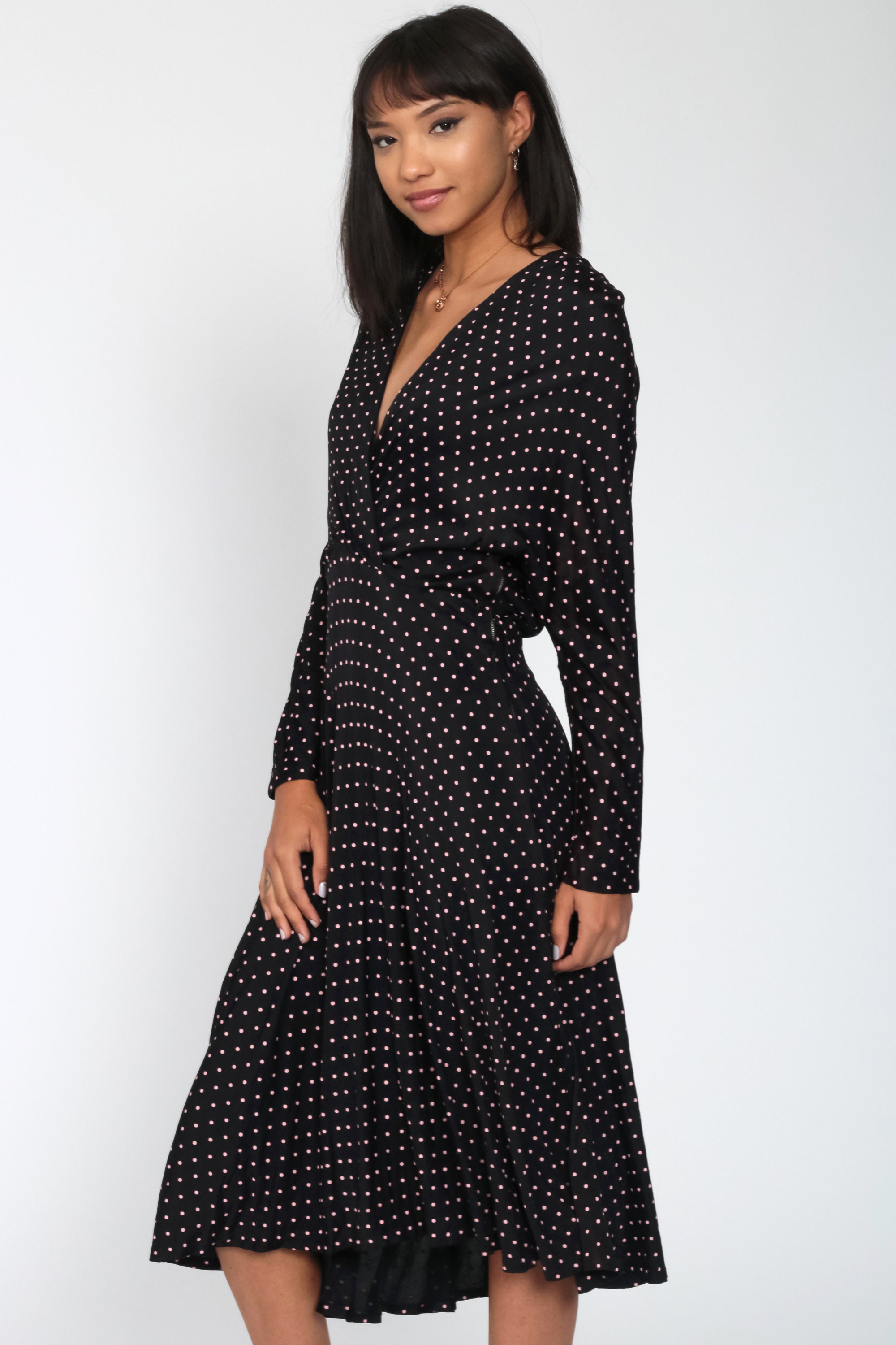 black dress with polka dot sleeves