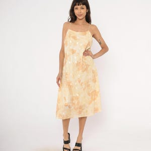 green emerald velvet dress Camisole Gold Maxi Dress – ECHOINE main image 1