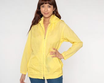 1980年代のオレンジナイロンフード付きジャケット - レトロなスウィッ