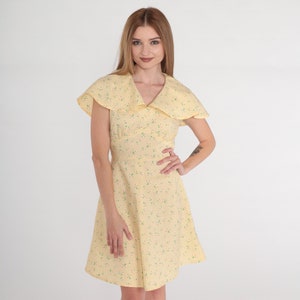 Gelbes Blumen Kleid 70er Jahre Babydoll Kleid Flatterärmel Minikleid Empire-Taille Retro Girly Sommer Zierliches Boho Minikleid Vintage 1970er Jahre Small S