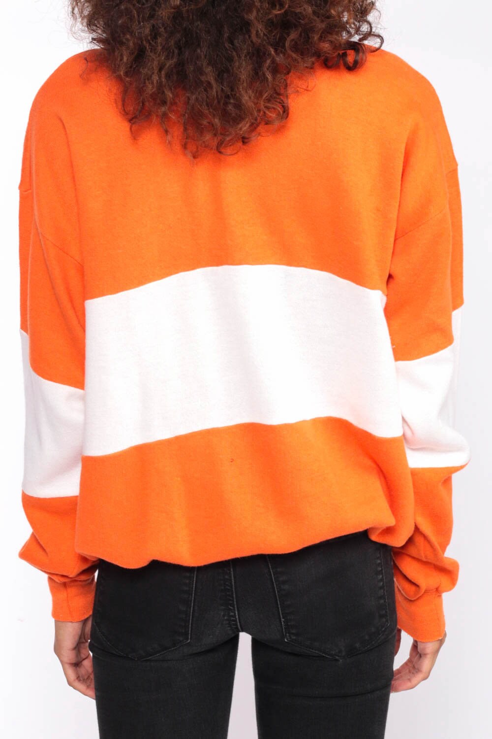 red and orange striped sweater