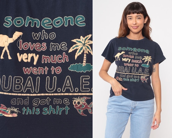Dubai Tourist Tee Y2K Blue Cotton Graphic T Shirt Travel Souvenir UAE "Someone Who Loves Me" Funny Vintage Humor Camel Palm Tree Medium M