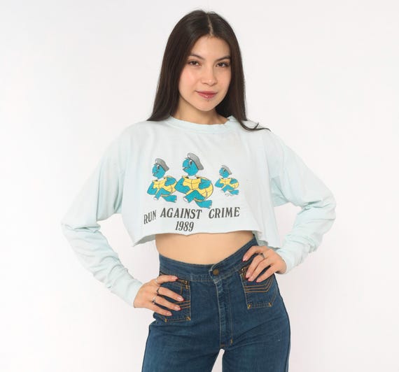 Run Against Crime 1989 Distressed Cropped Long Sleeve Tee Cartoon Turtle Police Cotton Crop Top Baby Blue Graphic 80s Novelty Shirt Medium M