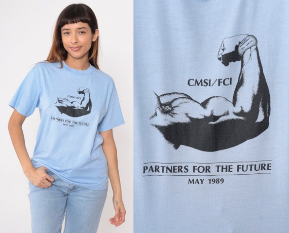80s Arm Muscle Shirt 1989 Weightlifter Tee CSMI FCI Parterns Graphic Shirt Baby Blue TShirt Vintage T Shirt Single Stitch Slogan Medium
