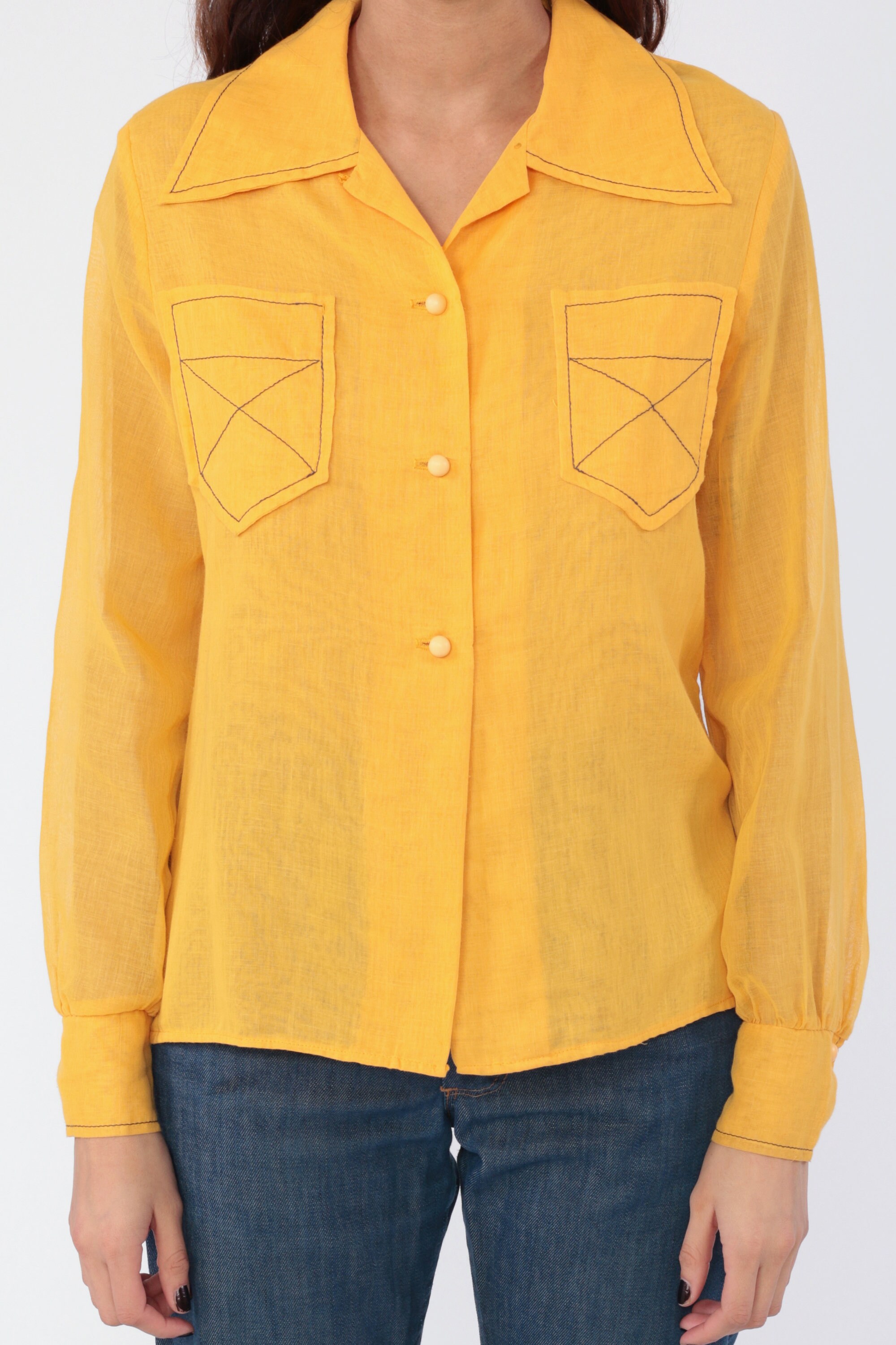 yellow button up shirt