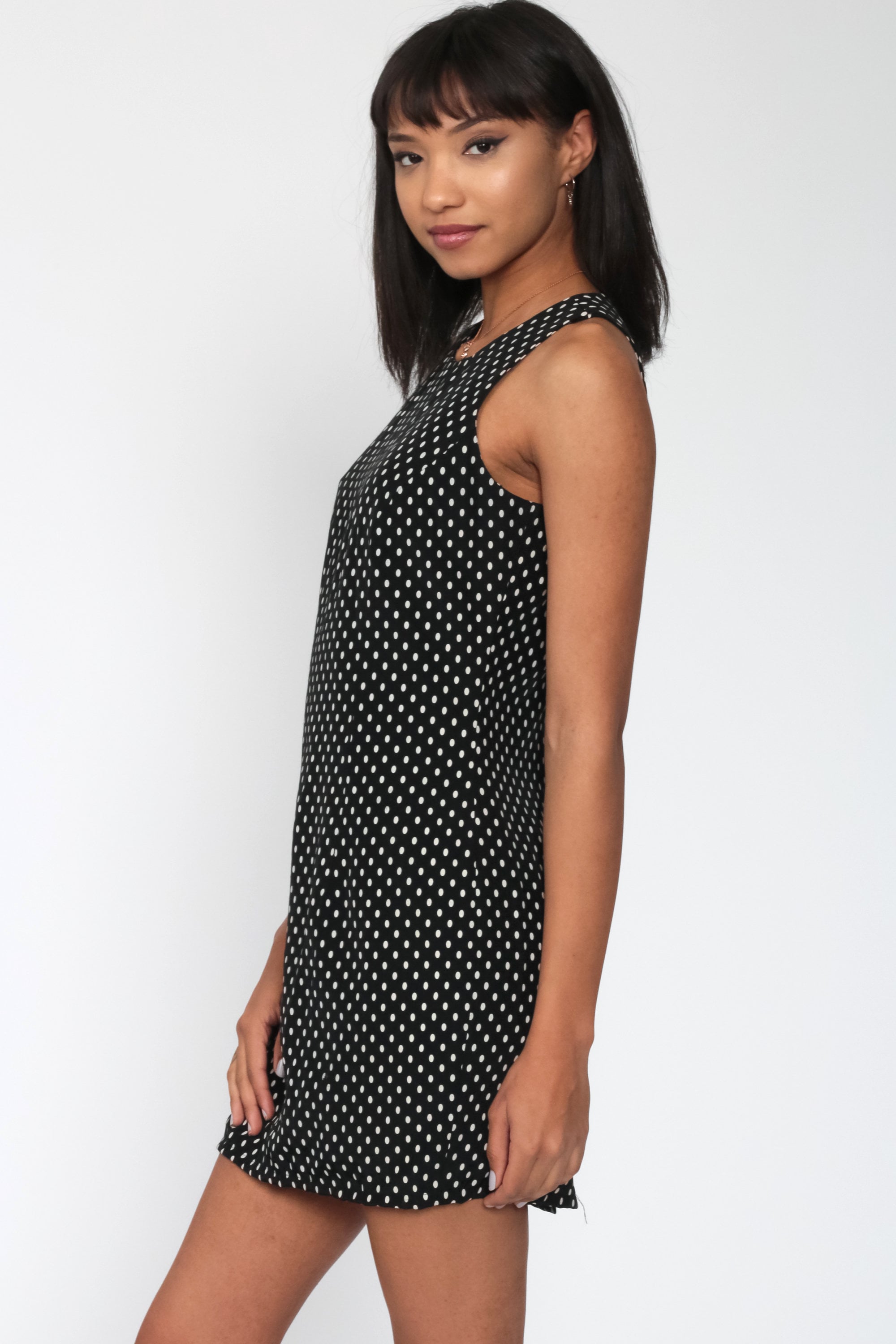 black dress with small white polka dots