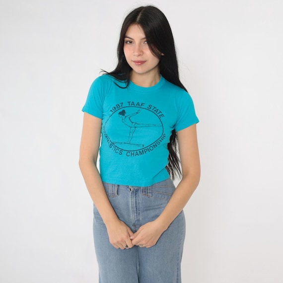 Vintage 80s Gymnastics T-Shirt Blue 1987 TAAF State Championship Tee Texas Short Sleeve Sporty Retro Crop Top 1980s Screen Stars xxs 2xs