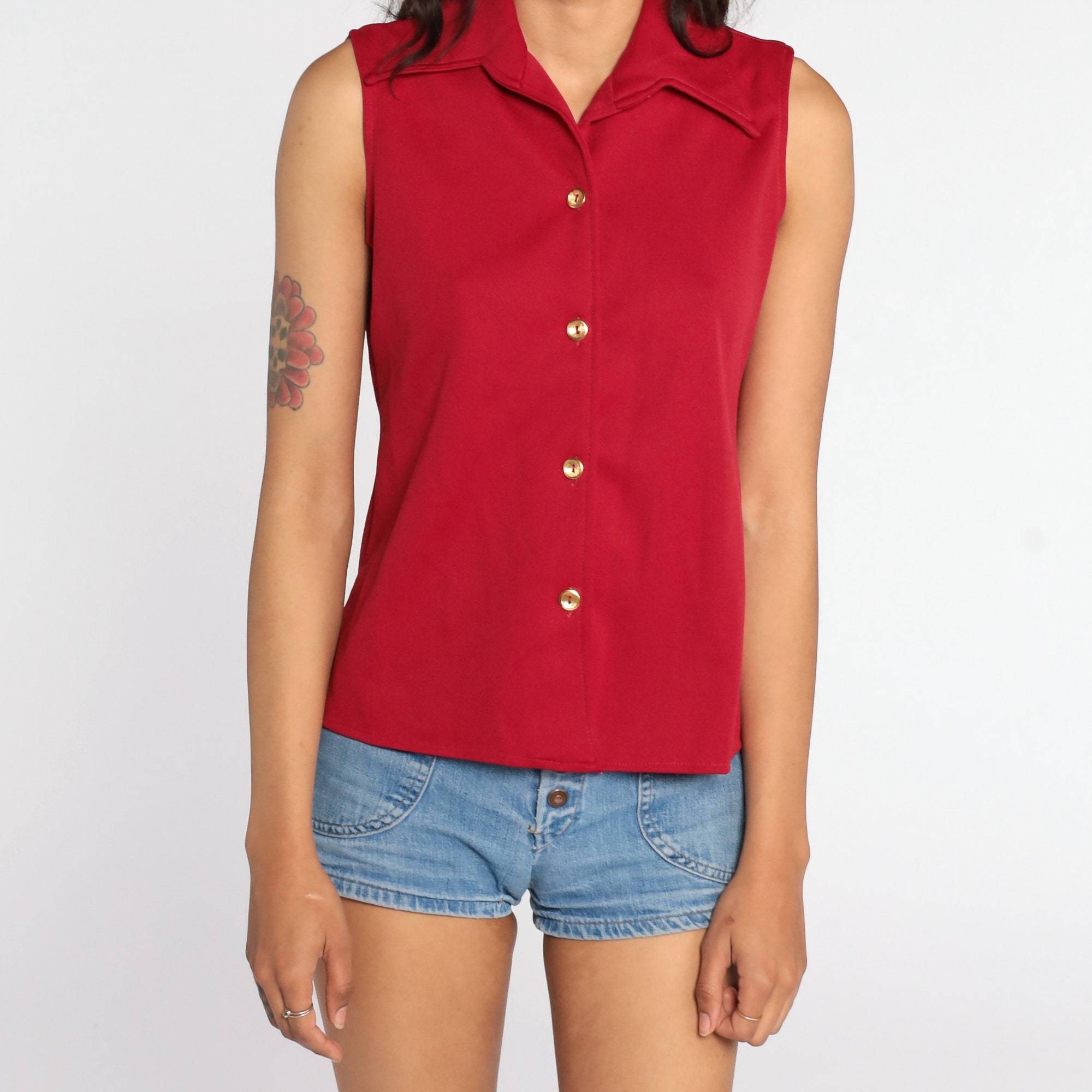 red sleeveless button up shirt red sleeveless button up shirt