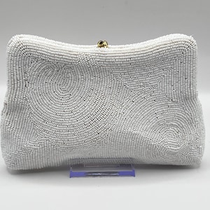 May include: A rustic wooden sign with the text "Welcome to our home" in white lettering. The sign features a distressed finish and a simple, inviting design, perfect for a front porch or entryway.