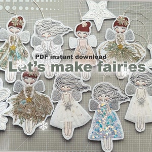 Puede incluir: Un conjunto de nueve adornos de fieltro bordados con hadas con vestidos y alas de diferentes colores. Los adornos están decorados con purpurina y lentejuelas. El texto "PDF instant download Let's make fairies" se muestra en la imagen.