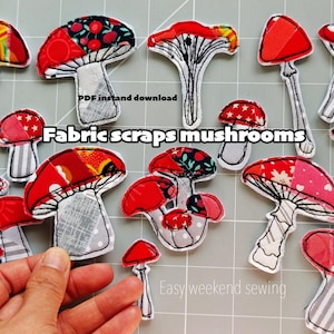 May include: A collection of fabric mushroom appliques in various red, white, and patterned designs. The text reads PDF instant download, Fabric scraps mushrooms, and Easy weekend sewing. Each mushroom features stitched outlines and stems.
