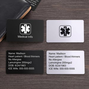 May include: Four rectangular medical alert cards in black and silver. Two cards feature the Star of Life symbol and the text Medical Info. Two cards display personal details: Name: Madison, Heart patient / Blood thinners, No Allergies, Lamotrigine 200mgx2, DOB: 6/24/1963, and ICE Wife: 555-555-5555.